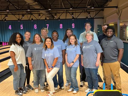 Regional Homes team members at a bowling alley